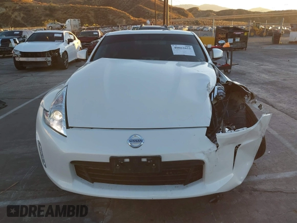2014 Nissan 370Z Touring с VIN JN1AZ4EH2EM635420, выставлен на аукционе IAAI как лот 40862653 с пробегом 68 004 миль миль и . История ставок и продаж доступна на DreamBid. Изображение 12.