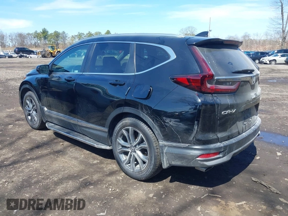 2020 Honda CR-V Touring with VIN 2HKRW2H98LH660573, listed as a IAAI auction lot 41524610 with 37,493 mi miles and . Bid and sale history available at DreamBid. Image 14.