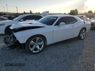 2014 Dodge Challenger SXT z VIN 2C3CDYAG7EH120963, wystawiony jako Copart lot #46169095 z przebiegiem 108 159 mil mil oraz Szkoda całkowita • Salvage title. Historia ofert i sprzedaży dostępna na DreamBid. Obrazek 1.