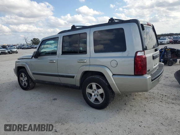 2009 Jeep Commander Sport with VIN 1J8HH48K59C514861, listed as a Copart auction lot 44076015 with 129,674 mi miles and Salvage title. Bid and sale history available at DreamBid. Image 2.