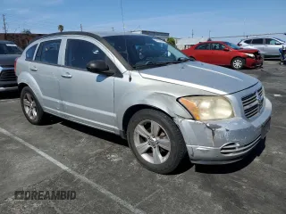 2010 Dodge Caliber SXT with VIN 1B3CB4HA4AD619210, listed as a Copart auction lot 54139335 with 155,383 mi miles and Clean Title. Bid and sale history available at DreamBid. Image 4.