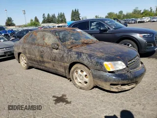 2000 Subaru Legacy L with VIN 4S3BE6353Y7216836, listed as a Copart auction lot 77437624 with Not provided miles and Salvage title. Bid and sale history available at DreamBid. Image 4.
