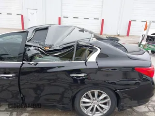 2015 Infiniti Q50 Premium with VIN JN1BV7AR8FM396828, listed as a IAAI auction lot 42313019 with 130,707 mi miles and . Bid and sale history available at DreamBid. Image 6.