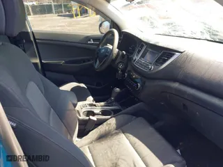 2017 Hyundai Tucson SE Plus with VIN KM8J3CA4XHU315340, listed as a IAAI auction lot 41857937 with 83,957 mi miles. Bid and sale history available at carsss.com. Image 5.