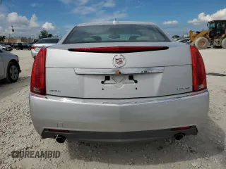 2009 Cadillac CTS RWD w/1SA with VIN 1G6DF577690145964, listed as a Copart auction lot 74073064 with 103,788 mi miles and Salvage Title. Bid and sale history available at carsss.com. Image 6.