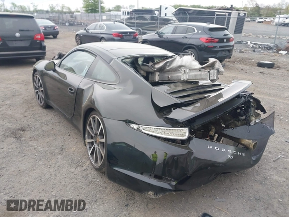 2014 Porsche 911 Carrera with VIN WP0AA2A92ES106536, listed as a IAAI auction lot 42048411 with 108,216 mi miles and . Bid and sale history available at DreamBid. Image 3.