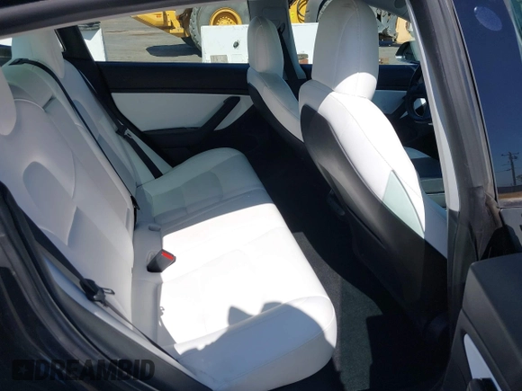 2019 Tesla Model 3 Long Range with VIN 5YJ3E1EB9KF231742, listed as a IAAI auction lot 42114608 with 86,657 mi miles and . Bid and sale history available at DreamBid. Image 8.