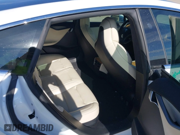 2020 Tesla Model S Long Range with VIN 5YJSA1E23LF360441, listed as a IAAI auction lot 41312865 with 68,967 mi miles and . Bid and sale history available at DreamBid. Image 8.
