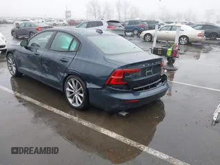 2019 Volvo S60 Momentum with VIN 7JRA22TK2KG013593, listed as a IAAI auction lot 41560933 with 49,619 mi miles. Bid and sale history available at carsss.com. Image 3.