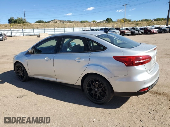 2016 Ford Focus SE with VIN 1FADP3F29GL314719, listed as a Copart auction lot 77686334 with 76,515 mi miles and Salvage title. Bid and sale history available at DreamBid. Image 2.