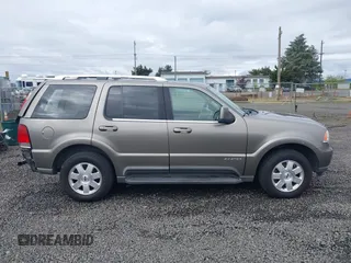 2003 Lincoln Aviator Premium z VIN 5LMEU78H93ZJ29120, wystawiony jako IAAI lot #42239414 z przebiegiem 196 479 mil mil oraz . Historia ofert i sprzedaży dostępna na DreamBid. Obrazek 14.