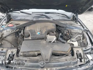 2018 BMW 3 Series 320i with VIN WBA8E1G51JNU91319, listed as a IAAI auction lot 41690084 with 67,609 mi miles. Bid and sale history available at carsss.com. Image 10.