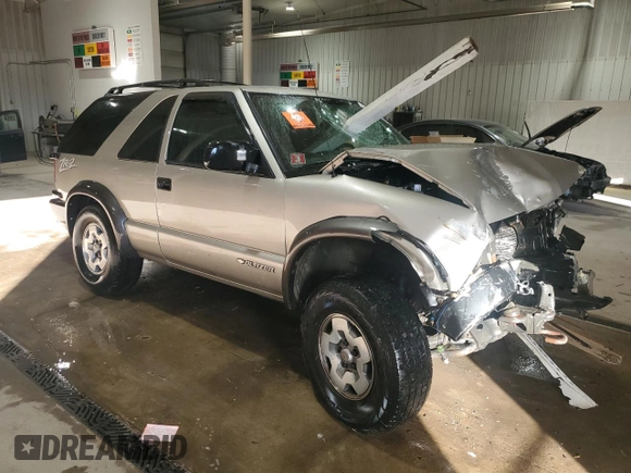2004 Chevrolet Blazer LS z VIN 1GNCT18X34K143280, wystawiony jako Copart lot #50494785 z przebiegiem Nie podano mil oraz Szkoda całkowita • Salvage title. Historia ofert i sprzedaży dostępna na DreamBid. Obrazek 4.