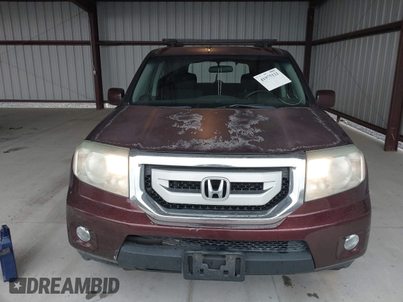 2009 Honda Pilot EX with VIN 5FNYF48499B005597, listed as a IAAI auction lot 41975121 with 309,769 mi miles. Bid and sale history available at carsss.com. Image 12.