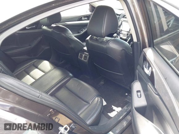 2016 Nissan Maxima SV with VIN 1N4AA6AP0GC904168, listed as a IAAI auction lot 41865822 with 121,999 mi miles and . Bid and sale history available at DreamBid. Image 8.