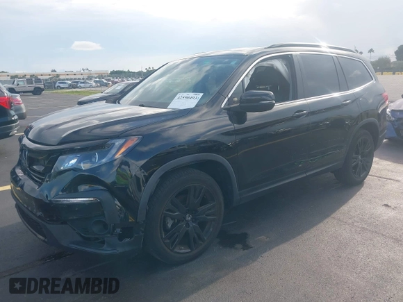2022 Honda Pilot Special Edition with VIN 5FNYF5H25NB026414, listed as a IAAI auction lot 42590493 with 26,600 mi miles and . Bid and sale history available at DreamBid. Image 17.
