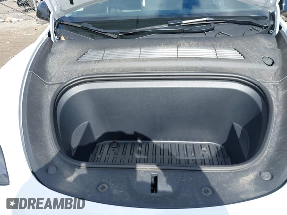 2023 Tesla Model Y Long Range with VIN 7SAYGDEE7PF832007, listed as a IAAI auction lot 41751598 with 14,126 mi miles and . Bid and sale history available at DreamBid. Image 10.