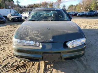 2000 Oldsmobile Intrigue GLS z VIN 1G3WX52H5YF100075, wystawiony jako Copart lot #79327534 z przebiegiem 158 710 mil mil oraz Tytuł czysty. Historia ofert i sprzedaży dostępna na DreamBid. Obrazek 5.