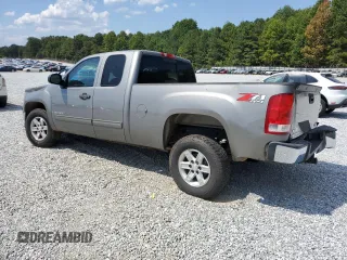 2009 GMC Sierra 1500 SLE with VIN 1GTEK29099Z115302, listed as a Copart auction lot 69263134 with 140,903 mi miles and Salvage Title. Bid and sale history available at carsss.com. Image 2.
