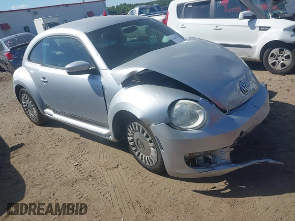 2014 Volkswagen Beetle 2.5L w/Sun with VIN 3VWJP7AT7EM633386, listed as a IAAI auction lot 42060290 with 273,374 mi miles and . Bid and sale history available at DreamBid. Image 1.