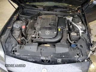 2015 Mercedes-Benz SLK 250 z VIN WDDPK4HA9FF104558, wystawiony jako Copart lot #52104545 z przebiegiem 77 054 mil mil oraz Szkody całkowita. Historia ofert i sprzedaży dostępna na DreamBid. Obrazek 11.