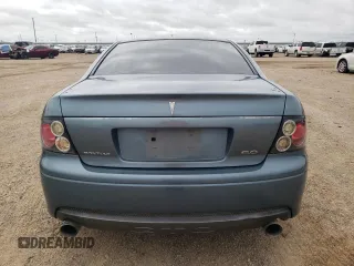 2006 Pontiac GTO z VIN 6G2VX12U06L550451, wystawiony jako Copart lot #54823105 z przebiegiem 273 049 mil mil oraz Tytuł czysty. Historia ofert i sprzedaży dostępna na DreamBid. Obrazek 6.