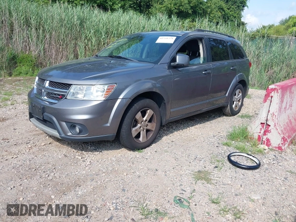 2012 Dodge Journey SXT with VIN 3C4PDCBG3CT310679, listed as a IAAI auction lot 42731771 with 165,928 mi miles and . Bid and sale history available at DreamBid. Image 2.