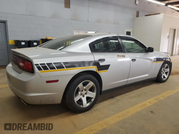 2013 Dodge Charger Police with VIN 2C3CDXAT6DH642327, listed as a Copart auction lot 50945865 with 179,229 mi miles and Salvage Title. Bid and sale history available at DreamBid. Image 3.