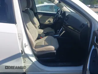 2014 Mazda CX-5 Grand Touring with VIN JM3KE2DY1E0424890, listed as a IAAI auction lot 42052437 with 107,793 mi miles. Bid and sale history available at carsss.com. Image 5.