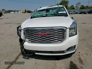 2019 GMC Yukon Denali with VIN 1GKS1CKJ7KR194428, listed as a Copart auction lot 71191064 with 56,409 mi miles and Salvage Title. Bid and sale history available at carsss.com. Image 15.