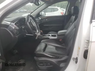 2013 Cadillac SRX Performance Collection with VIN 3GYFNHE34DS597871, listed as a Copart auction lot 56470795 with 208,504 mi miles and Salvage title. Bid and sale history available at DreamBid. Image 7.