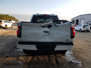 2024 Ford F-150 Lightning Flash with VIN 1FT6W3L7XRWG07097, listed as a Copart auction lot 76047344 with 2,172 mi miles and Salvage Title. Bid and sale history available at carsss.com. Image 6.