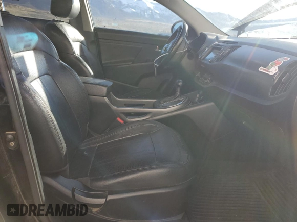 2011 Kia Sportage SX with VIN KNDPCCA66B7150506, listed as a Copart auction lot 50261715 with 199,282 mi miles and Salvage title. Bid and sale history available at DreamBid. Image 7.