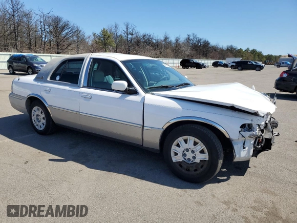 2005 Mercury Grand Marquis GS with VIN 2MEFM74W55X654070, listed as a Copart auction lot 53114785 with 56,128 mi miles and Salvage Title. Bid and sale history available at DreamBid. Image 4.