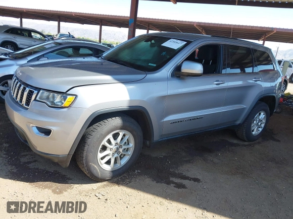 2018 Jeep Grand Cherokee Laredo E with VIN 1C4RJEAG3JC399869, listed as a IAAI auction lot 42305627 with 64,004 mi miles and . Bid and sale history available at DreamBid. Image 2.