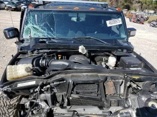 2006 Hummer H2 z VIN 5GRGN23U06H104393, wystawiony jako Copart lot #46208975 z przebiegiem 168 053 mil mil oraz Szkoda całkowita • Salvage title. Historia ofert i sprzedaży dostępna na DreamBid. Obrazek 12.