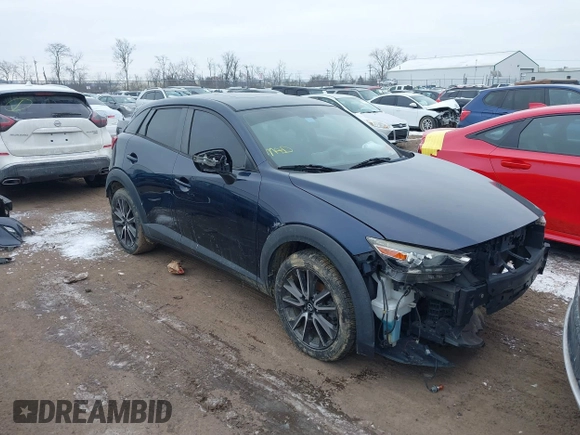 2017 Mazda CX-3 Touring z VIN JM1DKFC75H0173127, wystawiony jako IAAI lot #41614605 z przebiegiem 101 963 mil mil oraz . Historia ofert i sprzedaży dostępna na DreamBid. Obrazek 1.