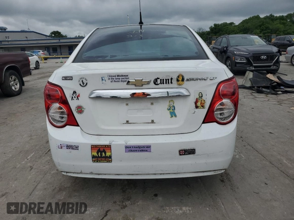 2013 Chevrolet Sonic LT with VIN 1G1JC5SH9D4137246, listed as a Copart auction lot 56001065 with 141,545 mi miles and Clean Title. Bid and sale history available at DreamBid. Image 6.