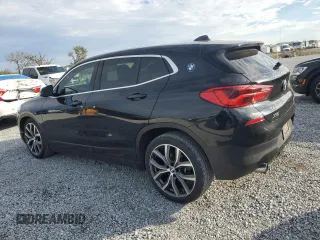 2019 BMW X2 sDrive28i with VIN WBXYJ3C56K5N36579, listed as a Copart auction lot 88320995 with 66,143 mi miles and Salvage Title. Bid and sale history available at carsss.com. Image 2.