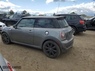 2009 MINI Cooper Hardtop S with VIN WMWMF73529TX40593, listed as a Copart auction lot 51852154 with 115,858 mi miles and Salvage Title. Bid and sale history available at carsss.com. Image 2.