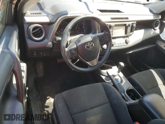 2018 Toyota RAV4 XLE with VIN 2T3WFREVXJW471443, listed as a Copart auction lot 54890655 with 131,677 mi miles and Salvage title. Bid and sale history available at DreamBid. Image 8.
