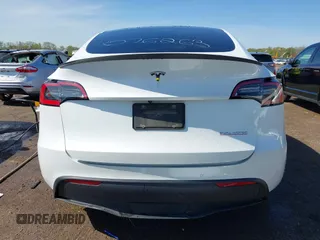 2021 Tesla Model Y Performance z VIN 5YJYGDEF0MF076263, wystawiony jako IAAI lot #42134022 z przebiegiem Nie podano mil oraz . Historia ofert i sprzedaży dostępna na DreamBid. Obrazek 16.