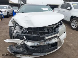 2015 Toyota Camry Hybrid LE with VIN 4T1BD1FK0FU175597, listed as a IAAI auction lot 41455315 with 116,380 mi miles. Bid and sale history available at carsss.com. Image 12.
