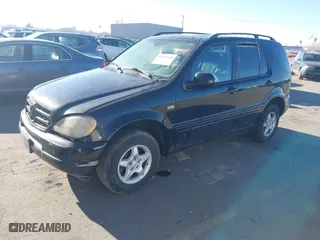 2001 Mercedes-Benz M-Class with VIN 4JGAB54E31A269408, listed as a IAAI auction lot 41642163 with 1 mi miles. Bid and sale history available at carsss.com. Image 2.