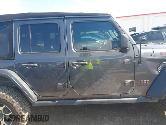 2021 Jeep Wrangler Unlimited Rubicon with VIN 1C4HJXFN5MW509483, listed as a IAAI auction lot 42245703 with 59,461 mi miles and . Bid and sale history available at DreamBid. Image 13.