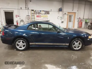 2002 Ford Mustang Standard z VIN 1FAFP40452F117630, wystawiony jako IAAI lot #41882744 z przebiegiem 85 218 mil mil oraz . Historia ofert i sprzedaży dostępna na DreamBid. Obrazek 14.