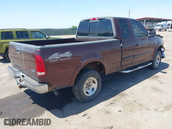 2000 Ford F-150 XL with VIN 1FTRX18L5YNA99713, listed as a IAAI auction lot 42194838 with Not provided miles and . Bid and sale history available at DreamBid. Image 4.