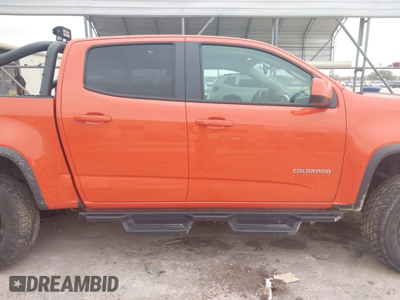2019 Chevrolet Colorado 4WD ZR2 z VIN 1GCGTEEN9K1333740, wystawiony jako IAAI lot #41565621 z przebiegiem 71 484 mil mil oraz . Historia ofert i sprzedaży dostępna na DreamBid. Obrazek 13.