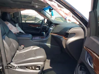 2017 Cadillac Escalade Luxury z VIN 1GYS3BKJ4HR354882, wystawiony jako IAAI lot #41920813 z przebiegiem 122 982 mil mil oraz . Historia ofert i sprzedaży dostępna na DreamBid. Obrazek 5.