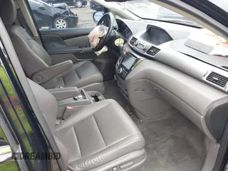2015 Honda Odyssey Touring Elite with VIN 5FNRL5H97FB124565, listed as a IAAI auction lot 42358412 with 206,444 mi miles and . Bid and sale history available at DreamBid. Image 5.